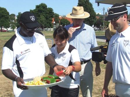 Enjoying the healthy fruit platters served up for senior afternoon teas every weekend at Moonee Valley are (L-R) MVCC coach Vic Hodge, Tien Polonidis, Health Minister David Davis and Michael Cumbo.